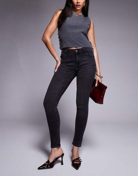 Vaqueros negros de corte pitillo de River Island - view 1