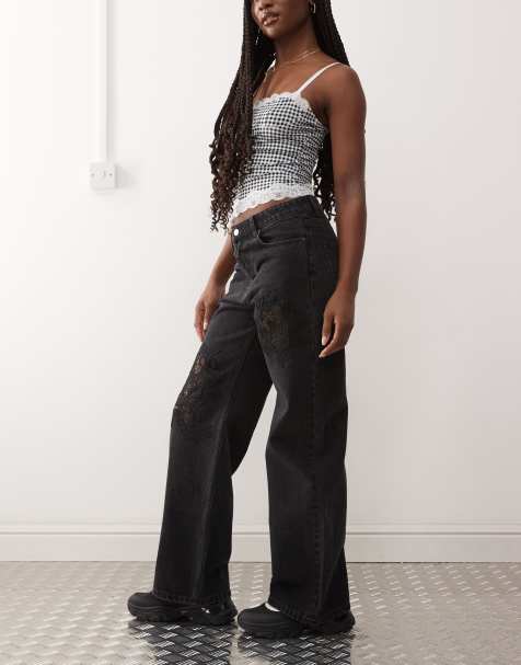 Vaqueros negros de corte suelto y talle bajo con detalle de abertura de encaje Missy de Monki - view 1