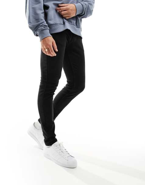 Vaqueros negros de corte superpitillo de New Look - view 1