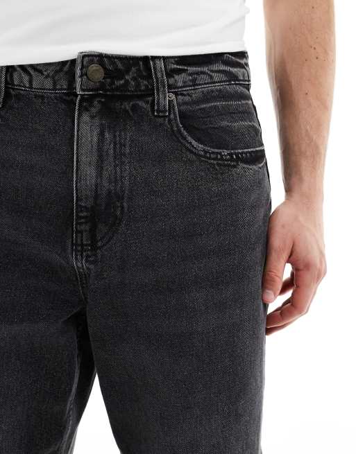 Vaqueros negros de corte tapered con jaretas de ASOS DESIGN, 3 de 5