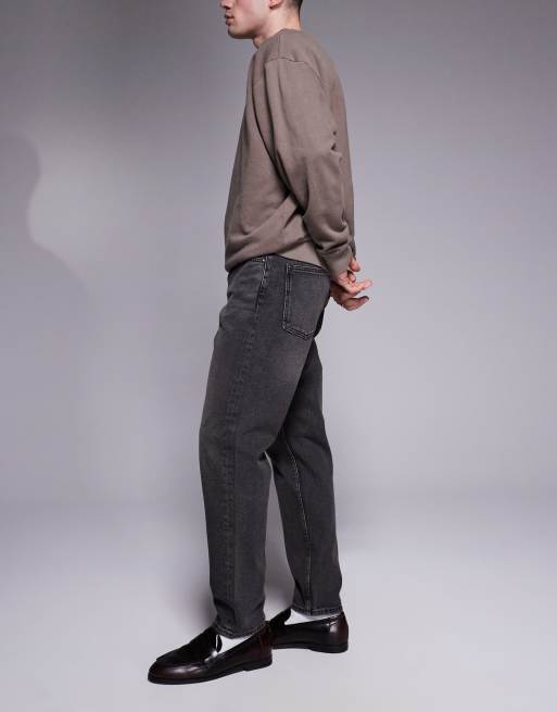 Vaqueros negros de corte tapered con lavado grisáceo de ASOS DESIGN, 3 de 5