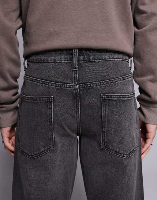 Vaqueros negros de corte tapered con lavado grisáceo de ASOS DESIGN, 4 de 5