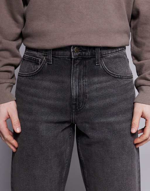 Vaqueros negros de corte tapered con lavado grisáceo de ASOS DESIGN, 5 de 5