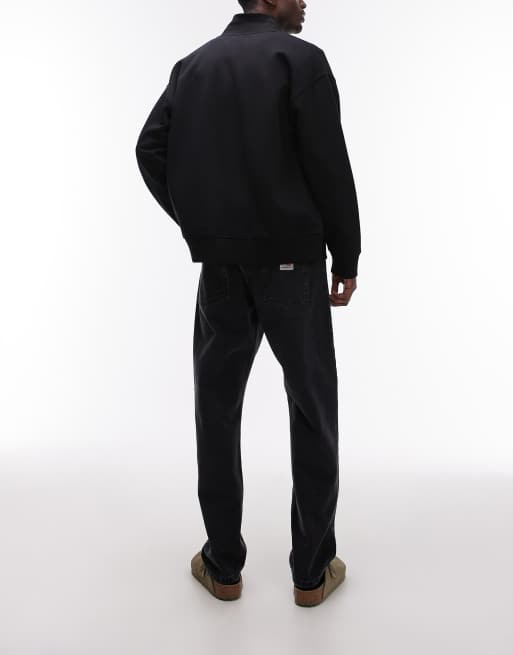 Vaqueros negros de corte tapered holgado Newel de Carhartt WIP, 2 de 5