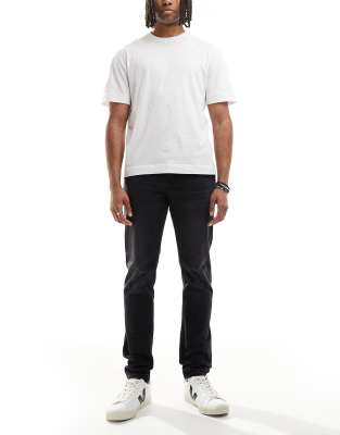 Vaqueros negros de corte tapered slim de Calvin Klein Jeans - view 1