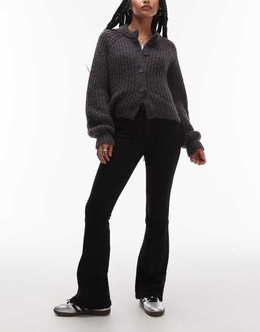 Vaqueros negros de talle alto y corte acampanado Jamie de Topshop Petite
