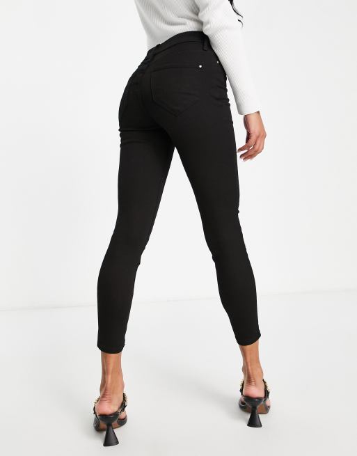 Vaqueros negros de talle medio y corte pitillo Molly de River Island Petite, 2 de 4