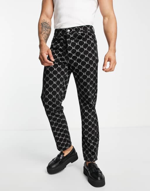 Vaqueros negros holgados con estampado integral del logo de Sixth June