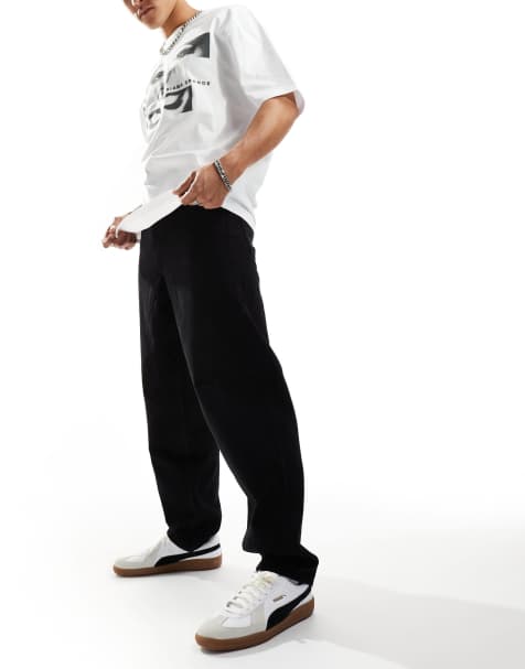 Vaqueros negros holgados con pinzas de ASOS DESIGN - view 1
