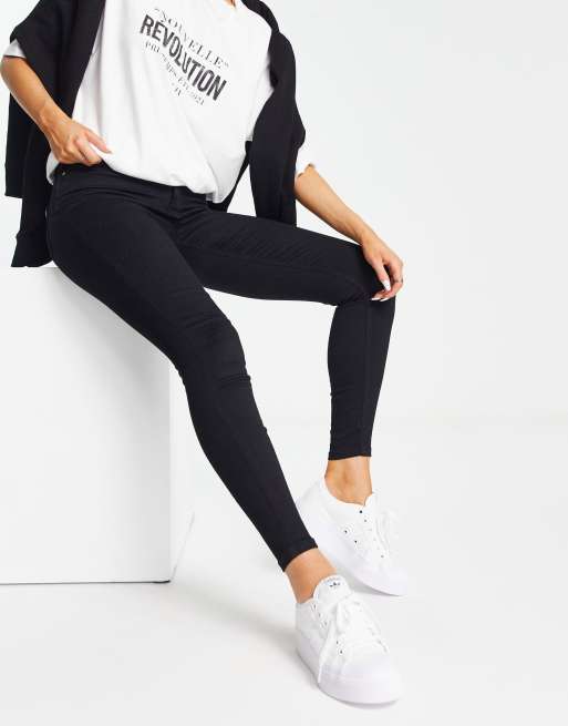 Vaqueros negros moldeadores de corte pitillo y talle medio Molly de River Island, 2 de 5