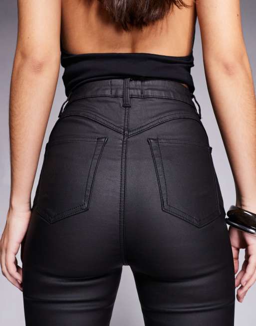 Vaqueros negros revestidos de corte pitillo Ultimate de ASOS DESIGN, 4 de 5
