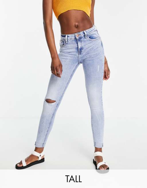 Vaqueros pitillo azul medio auténtico con roturas en las rodillas Amelie de River Island Tall
