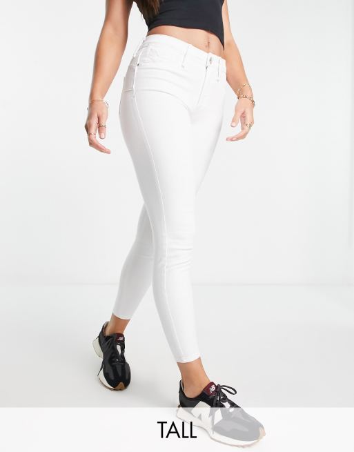 Vaqueros pitillo blancos con diseño moldeador de talle medio Molly de River Island Tall