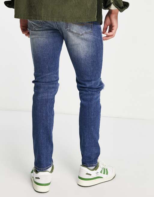Vaqueros pitillo con lavado azul oscuro y rodillas rasgadas de ASOS DESIGN, 4 de 4