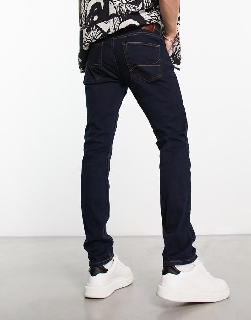 Vaqueros pitillo con lavado oscuro enjuagado de Hollister, 2 de 4