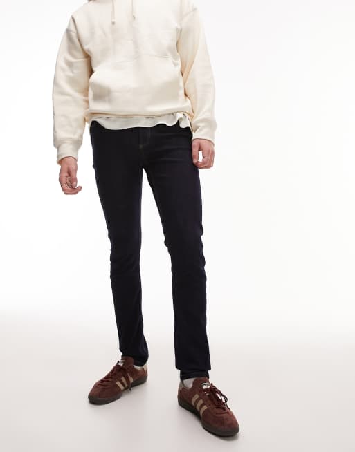 Vaqueros pitillo elásticos de denim crudo de Topman