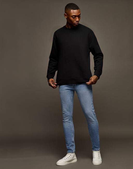 Vaqueros pitillo elásticos en lavado claro de Topman