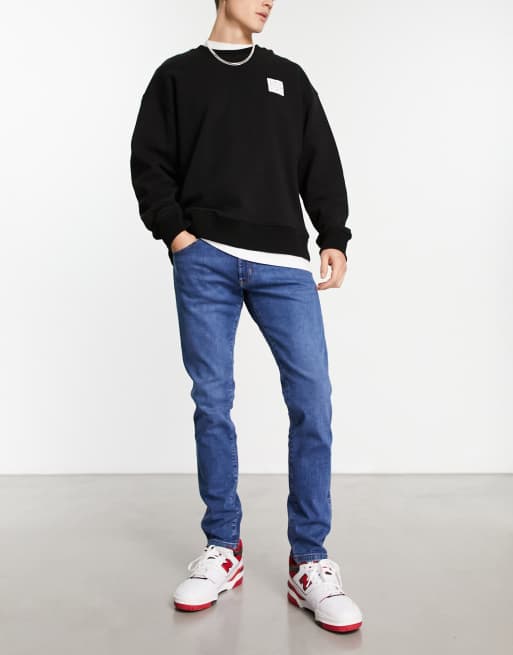 Vaqueros pitillo en azul Bryson de Wrangler