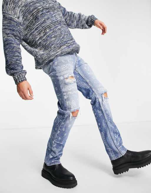 Vaqueros rasgados de corte recto con lavado azul claro y estampado de cachemir de Topman