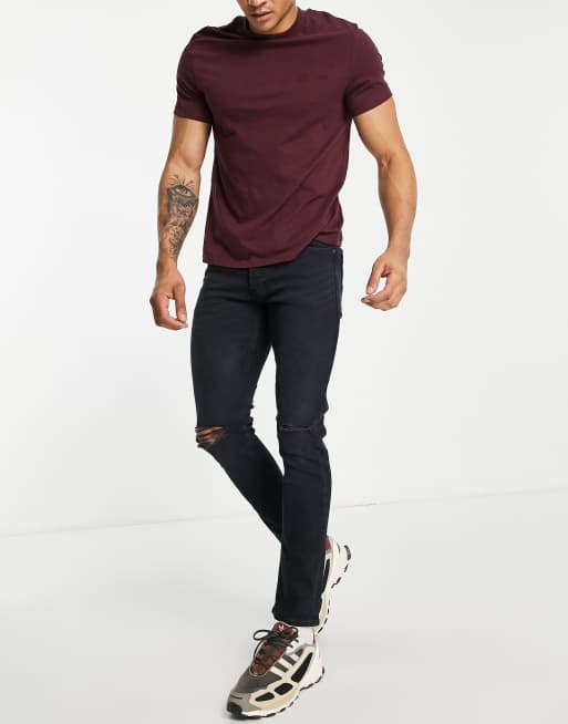 Vaqueros rasgados de corte slim con lavado negro de Jack & Jones