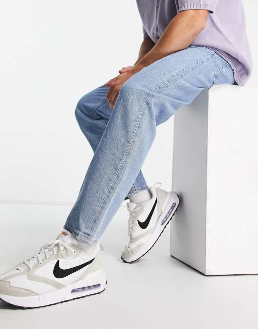 Vaqueros rígidos clásicos con diseño azul lavado medio de ASOS DESIGN