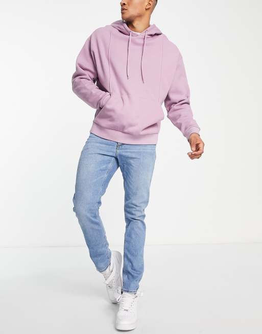 Vaqueros slim elásticos en azul claro lavado de ASOS DESIGN