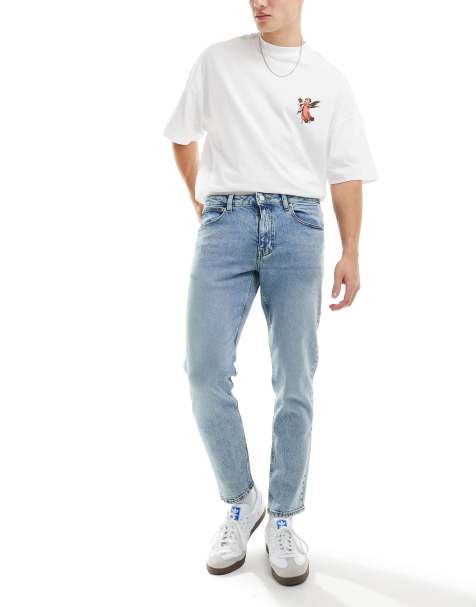 Vaqueros tapered azul claro lavado de corte elástico de ASOS DESIGN - view 1
