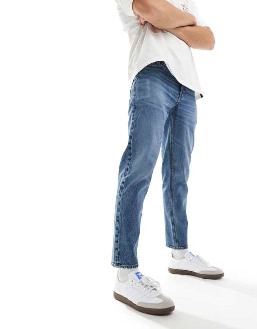 Vaqueros tapered azul lavado medio con diseño elástico de ASOS DESIGN