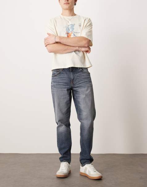 Vaqueros tapered azul lavado medio con diseño elástico de ASOS DESIGN - view 1