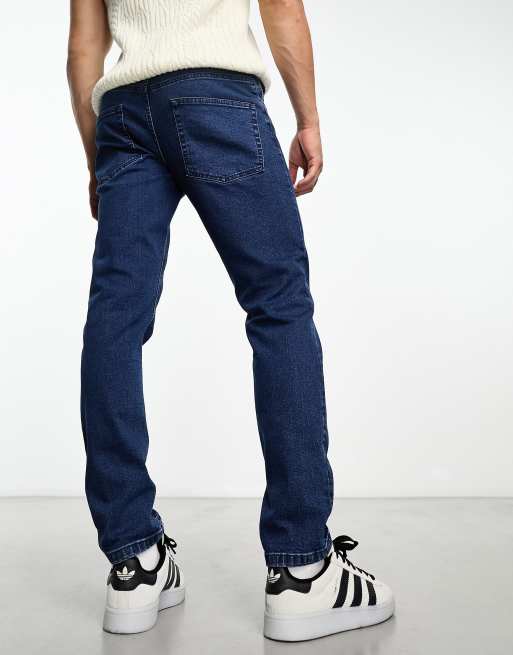 Vaqueros tapered azul lavado medio retro con diseño elástico de ASOS DESIGN , 2 de 4