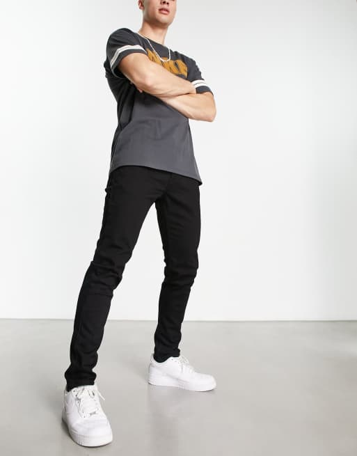 Vaqueros tapered de corte slim en negro 512 de Levi's, 4 de 4