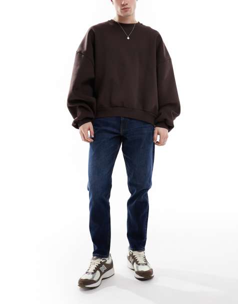 Vaqueros tapered elásticos con lavado oscuro de ASOS DESIGN - view 1