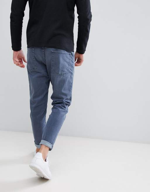 Vaqueros tapered en azul ahumado de ASOS DESIGN, 2 de 4