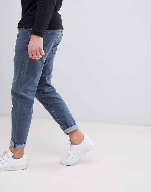 Vaqueros tapered en azul ahumado de ASOS DESIGN, 4 de 4