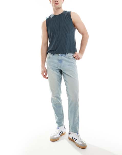 Vaqueros tapered en azul con lavado claro de ASOS DESIGN - view 1