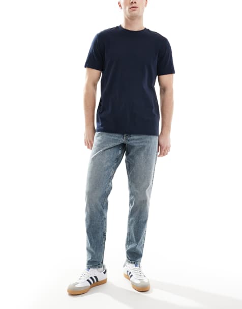 Vaqueros tapered en azul con lavado claro de ASOS DESIGN - view 1