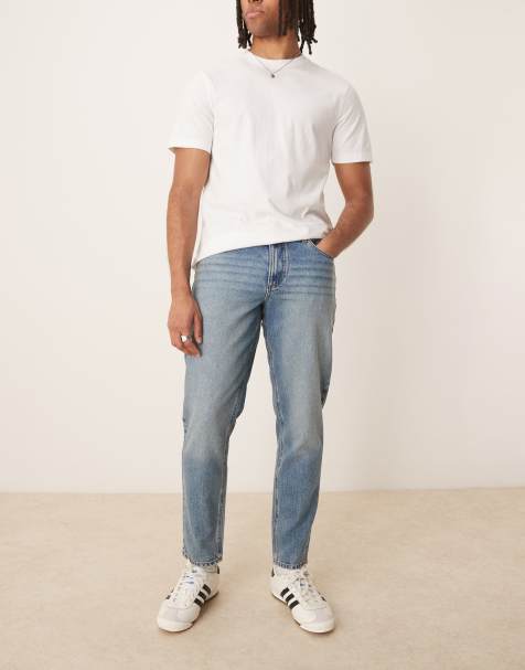 Vaqueros tapered en azul lavado medio de ASOS DESIGN - view 1