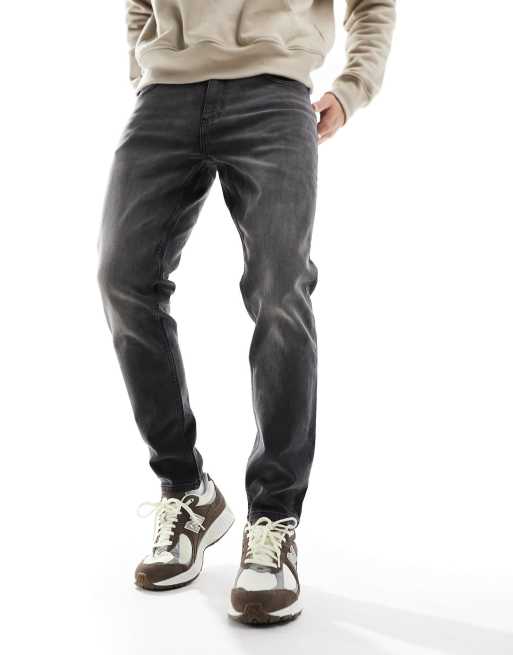 Vaqueros tapered en negro desgastado de ASOS DESIGN