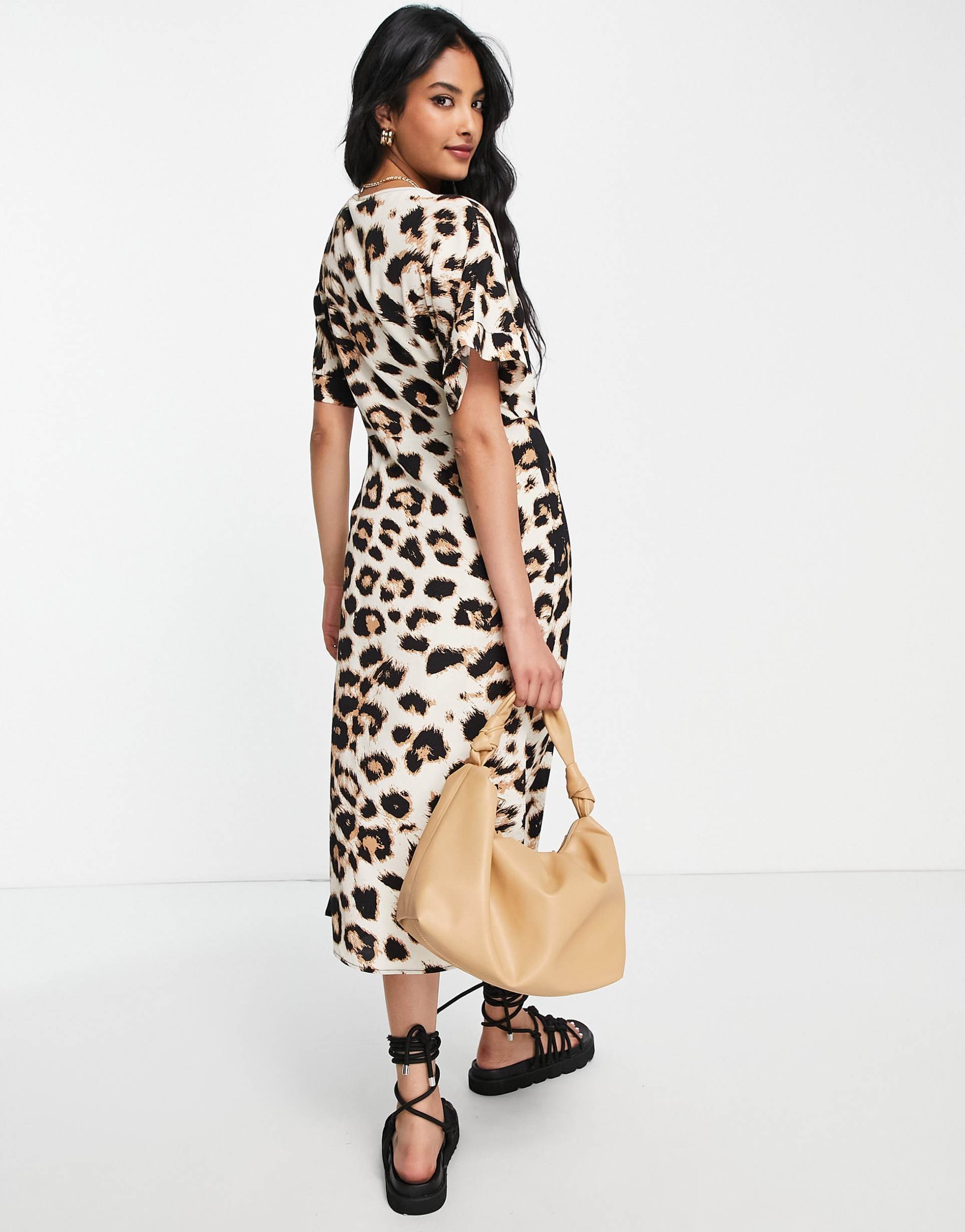 vero moda aware wrap midi dress in leopard print