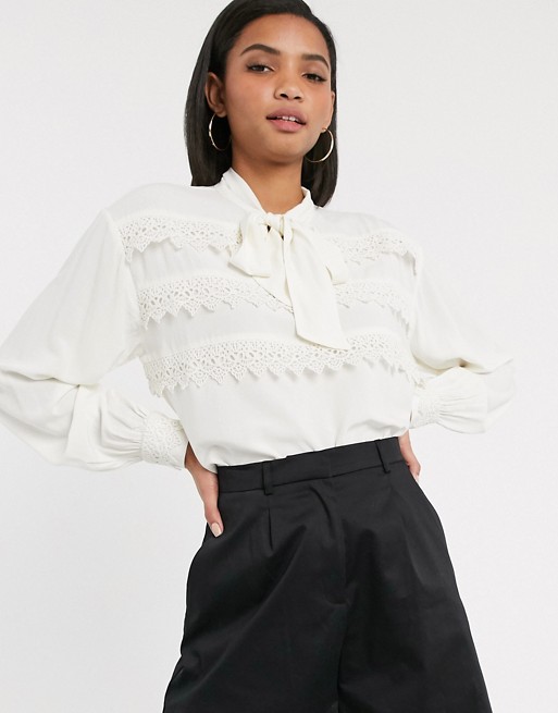 Vero Moda blouse with tie neck and crochet lace trim in cream