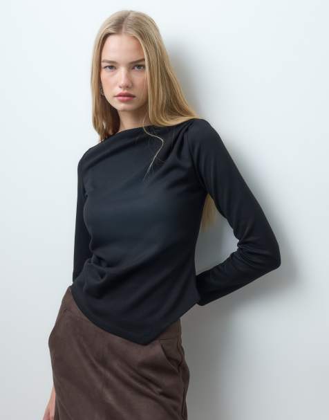 Vero Moda boatneck asymmetric long sleeve top in black - view 1