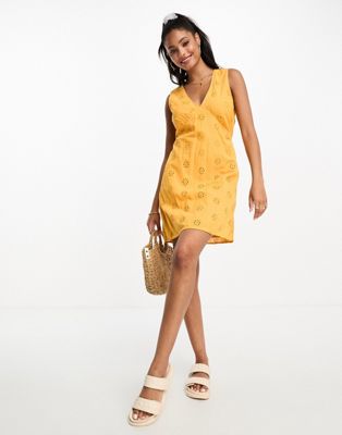 Vero Moda broderie mini dress with cross back in yellow