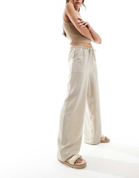 Vero Moda - Broek met wijde pijpen en elastische gestrikte taille in stone - view 1