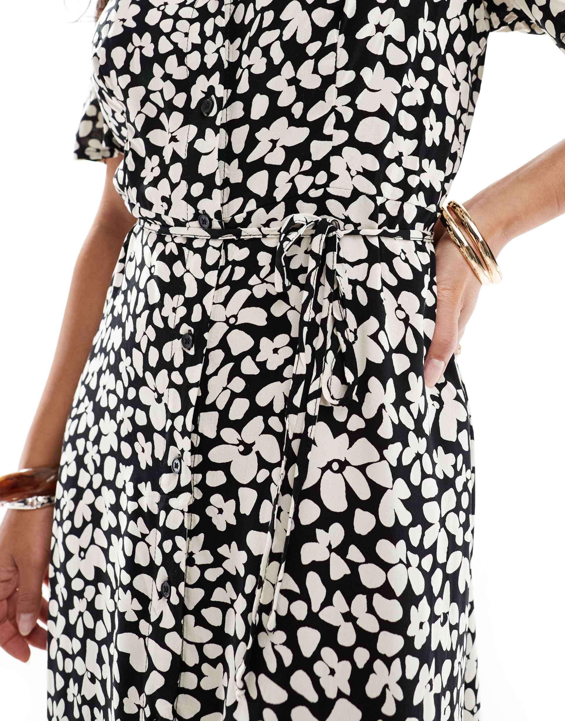 vero moda button down maxi dress in black and white floral print