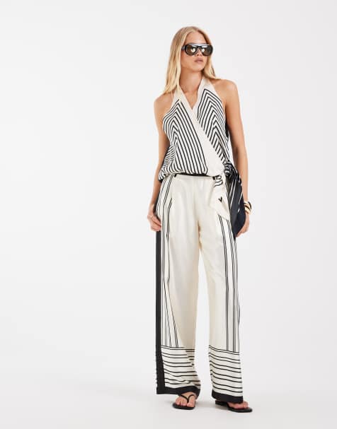 Vero Moda - Conjunto de pantalones palazzo de pernera ancha y top sin mangas con cuello de pico, estampado abstracto y detalle de lazada - view 1
