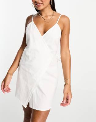 Vero Moda cotton wrap front mini beach dress in white | ASOS