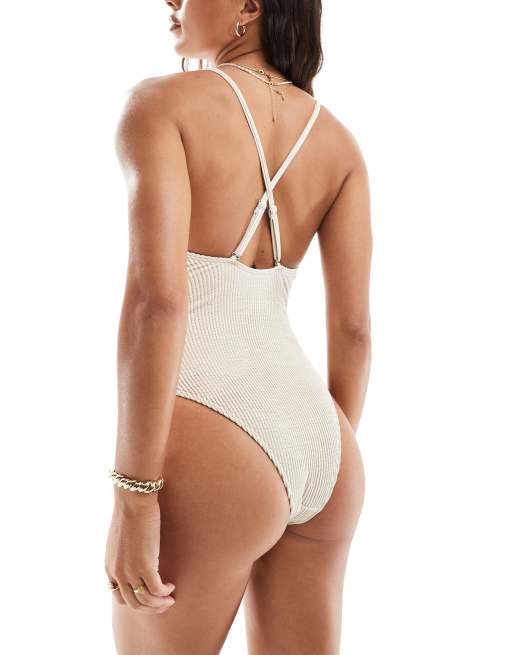 Vero Moda cross back crinkle swimsuit with high leg in cream ASOS