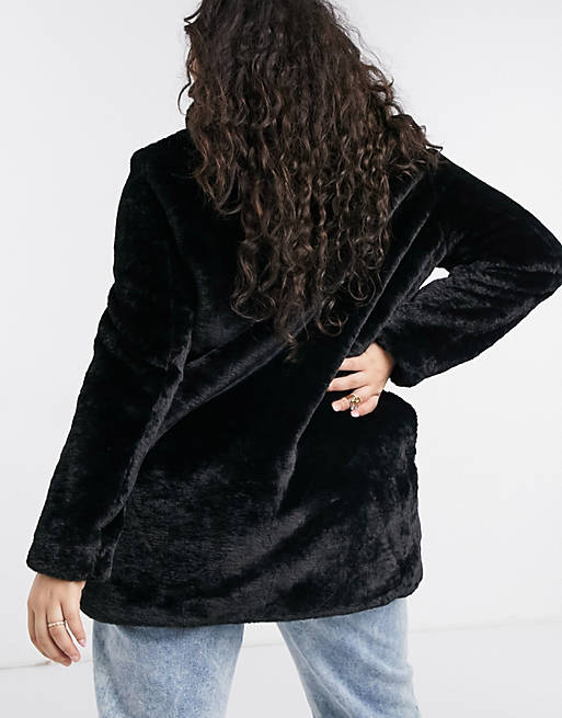 Vero Moda Curve faux fur coat in black | ASOS