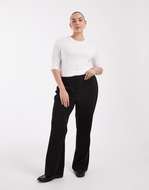 Vero Moda Curve high waist pull on flared trousers in black - view 1