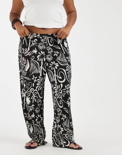 Vero Moda Curve – Plissee-Hose mit hohem Bund, weitem Bein und tropischem Blumenmuster, 2 von 5